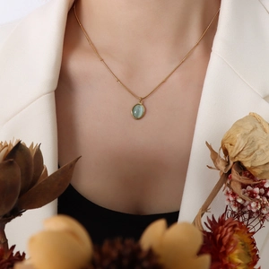 French vintage 18k gold plated titanium necklace with cat's eye stone oval pendant