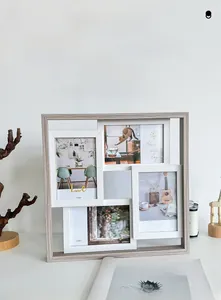 Close-up of modern 4x6in multi-photo frame with light gray wood grain texture