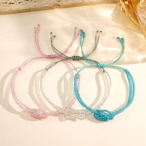 Bohemian handmade beaded bracelet set with adjustable knots in pink, white and blue