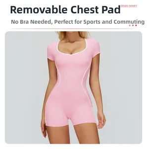 Pink athletic bodysuit with white trim and removable chest pads for yoga and fitness