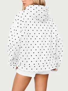 Women's casual white oversized hoodie with black polka dot print and drawstring hood