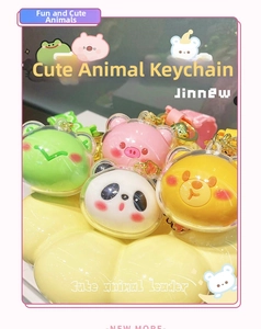 Detail of cute panda, frog, and pig acrylic pendants with golden lobster clasps