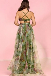 Detail of cross-back lace-up mesh dress with vibrant floral print and open back