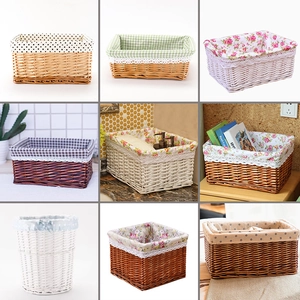 Detailed view of handmade woven storage baskets with diverse fabric liners and patterns