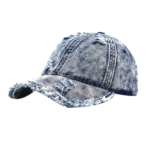 Distressed blue washed denim baseball cap with frayed edges and vintage streetwear style