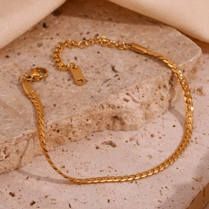 Detailed view of polished gold plated flat snake chain bracelet with adjustable clasp