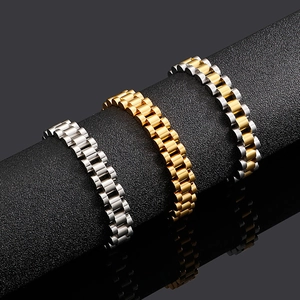 Titanium watch strap bracelet in gold, silver, and two-tone finishes on black pedestal