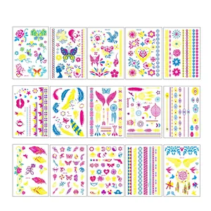 Macro detail of 15 waterproof glow tattoo stickers with feathers and bohemian patterns