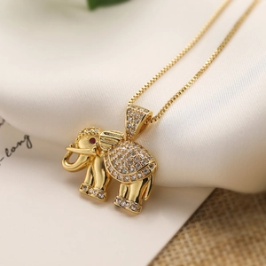 Luxurious gold-plated elephant pendant necklace with sparkling zircons and red gemstone eye