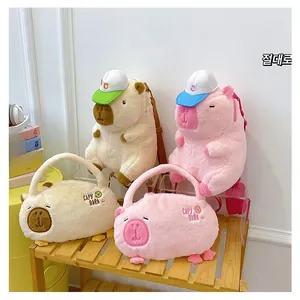 Detail view of plush Capybara backpack and handbag in soft pink and cream colors