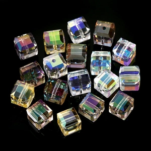 Macro shot of faceted cube crystal glass beads with aurora AB finish for DIY jewelry