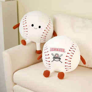 Creative plush baseball dolls with cute faces and limbs on a soft beige sofa