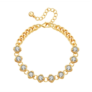Detailed view of gold plated bracelet with nine square zircons and lobster clasp closure