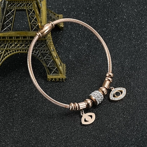 Roségoldenes Edelstahl-Armband mit bösem Blick, Flechtmuster und Magnetverschluss