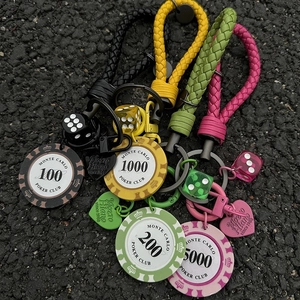Set of four woven rope keychains with Monte Carlo poker chips and translucent dice charms