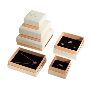 Elegant beige and pink jewelry gift box set with black velvet lining for rings and necklaces