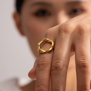 18K gold plated titanium steel open ring with irregular lava flower design on finger