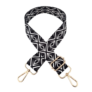Adjustable black and white geometric pattern replacement strap with gold metal hooks