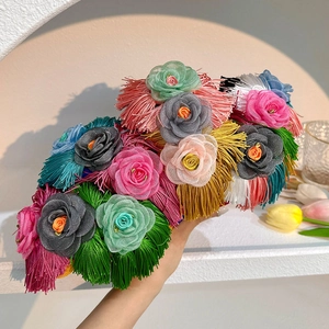 Handmade fabric floral headband with decorative fringes in vibrant assorted colors