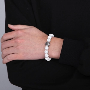 Mens white marble stone beaded bracelet with antique silver lion head on wrist