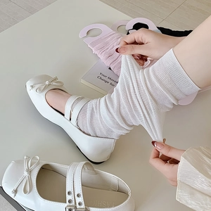Breathable white ballet style mesh leg warmers paired with classic Mary Jane shoes