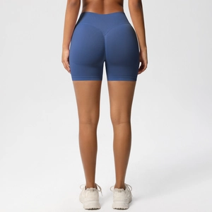 Detail view of high waist seamless yoga shorts with peach lift and V-shaped back seam