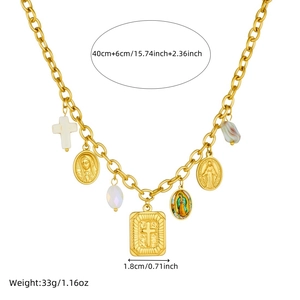 Detail view of gold necklace with Virgin Mary pendants and size measurement labels