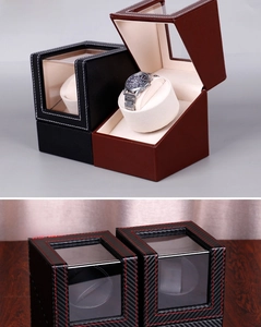 Detail of single automatic watch winder in carbon fiber and PU leather texture