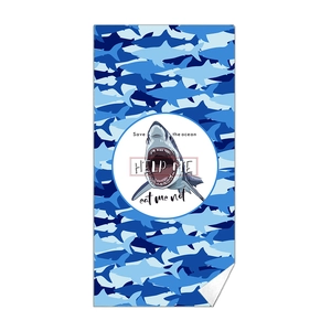Microfiber beach towel with blue shark silhouette print and Save the ocean slogan
