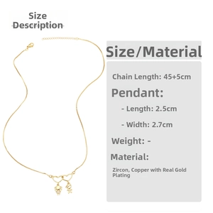 Detailed spec view of gold heart necklace with boy and girl pendants inlaid with zircon