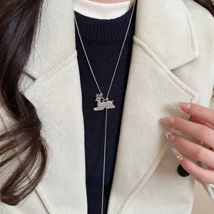 Elegant silver reindeer pendant necklace with sparkling rhinestones for winter fashion