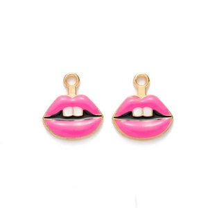Detailed close-up of pink lip-shaped metal alloy pendants for DIY jewelry making