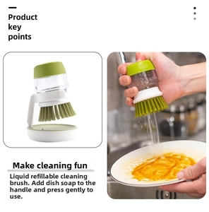 Kitchen soap dispensing brush with storage base for efficient dishwashing and cleaning