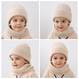 Close-up of beige ribbed knit baby hat and matching neck warmer set for winter warmth