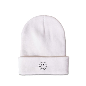 Detailed view of white knitted beanie featuring black embroidered melting face logo