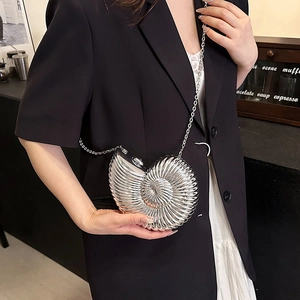 Silver snail-shaped snail evening bag with metallic finish and delicate chain shoulder strap