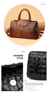 Detail of glossy crocodile pattern leather tote with golden magnetic closure buckle