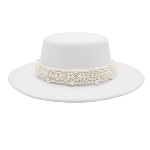 Detailed view of white felt boater hat with multi-layered elegant pearl decoration band