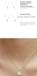 Detail of 18K gold plated titanium necklace with heart shell pendant and size chart