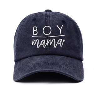 Navy blue washed cotton baseball cap featuring white BOY mama embroidery on front