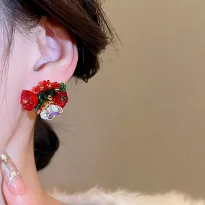 Floral beaded cluster stud earrings with red and green crystals for a festive elegant look