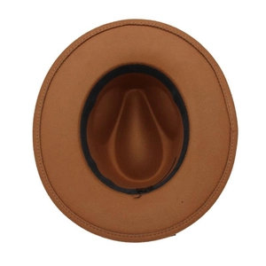Close-up of the interior structure with black sweatband on a brown felt western hat