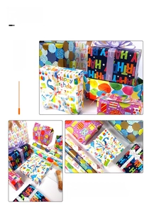 Detail of Happy Birthday wrapping paper with colorful balloons and dinosaur patterns