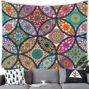 Close-up of mandala tapestry showing colorful geometric floral patterns on fabric
