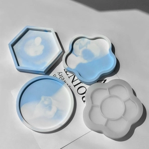 Oval and geometric resin coaster silicone mold with marble effect DIY craft results