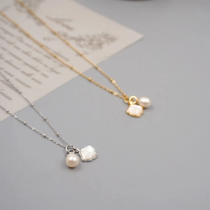 Minimalist freshwater pearl and shell pendant necklaces in gold and silver finishes