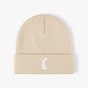 Beige knit beanie with white rabbit embroidery, cozy minimalist winter hat for men and women