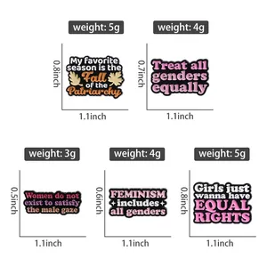 Größentabelle für feministische Pins mit Gewichts- und Maßangaben in Zoll und Gramm