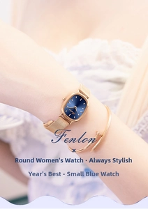 Elegant rose gold oval watch with blue dial worn with a matching nail-shaped bracelet