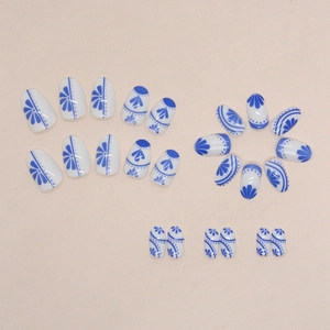 Oval blue and white porcelain style press-on nails with Chinese artistic flower patterns